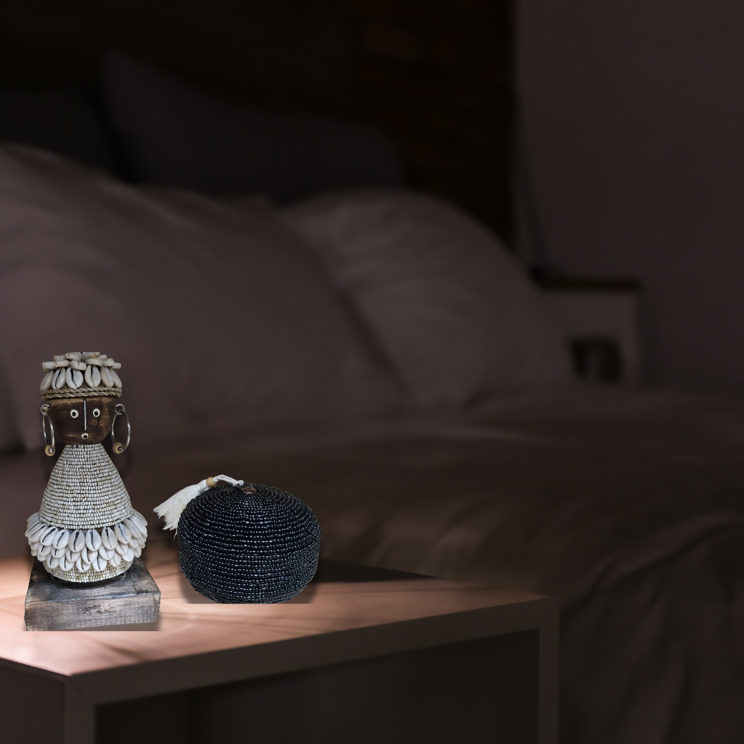 Night time setting in a bedroom witha a doll wooden design with a a beaded bastket 