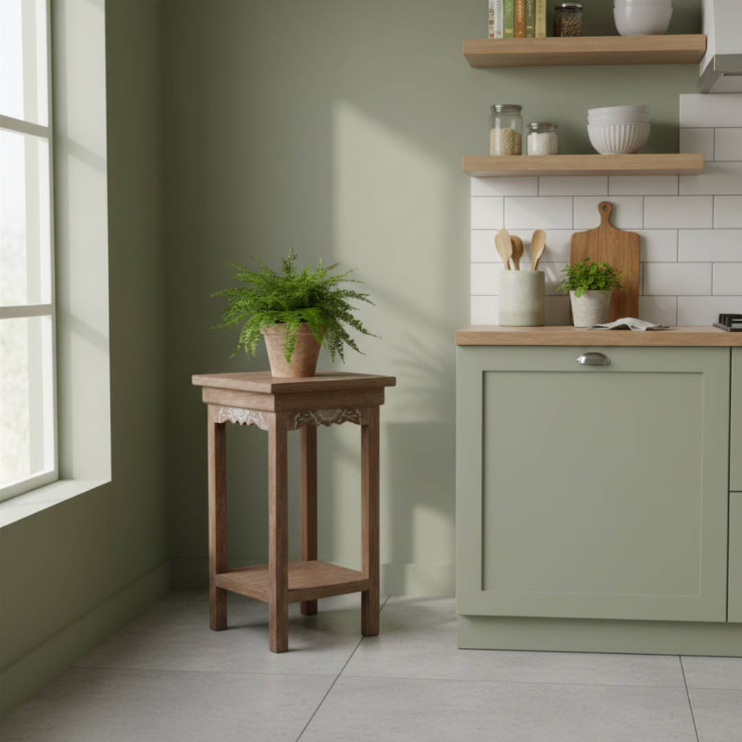 Side Table styled in a kitchen with potted plants and sage green cabinetry — Azure Decor