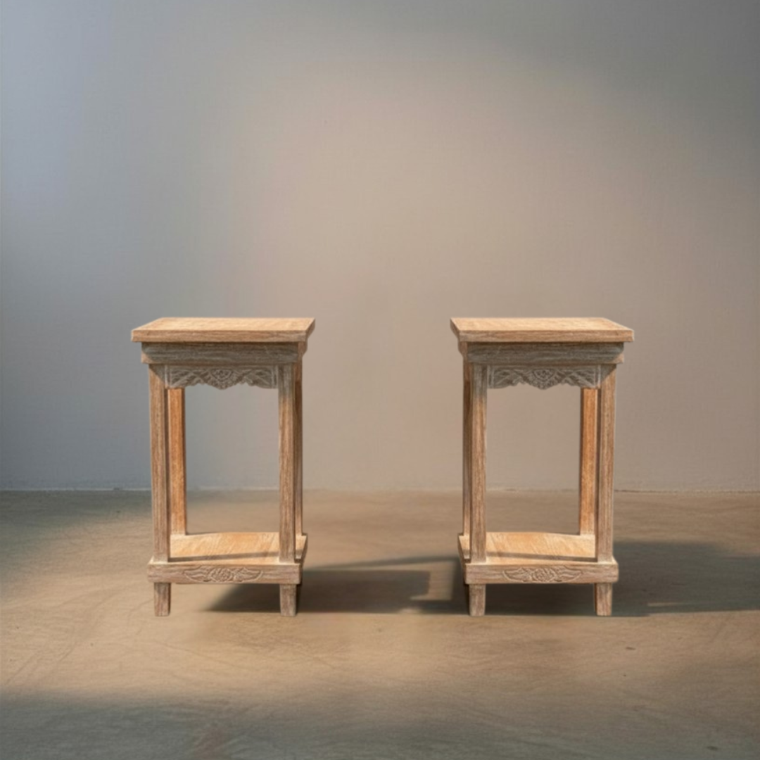 Two hand-carved Balinese furniture pieces with intricate detailing on a plain background