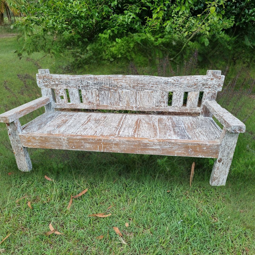 garden Bench in a green garden 