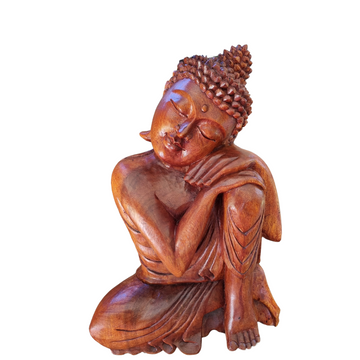 Close-up of a hand-carved Resting Buddha Solid Wood Carving, front view showing facial detail and robe carving, white background