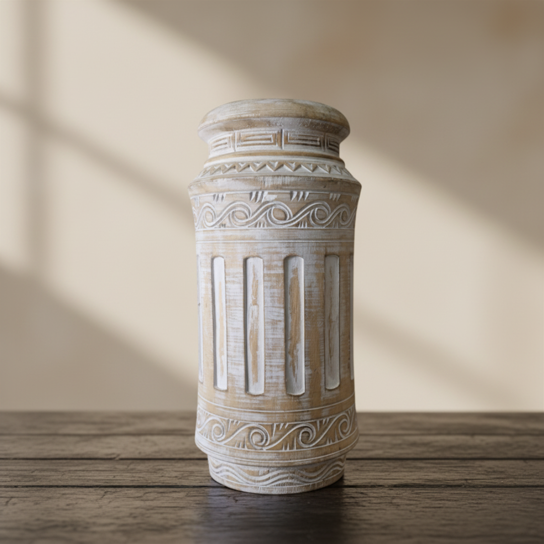 Decorative wooden pillar style  vase with intricate patterns on a wooden surface