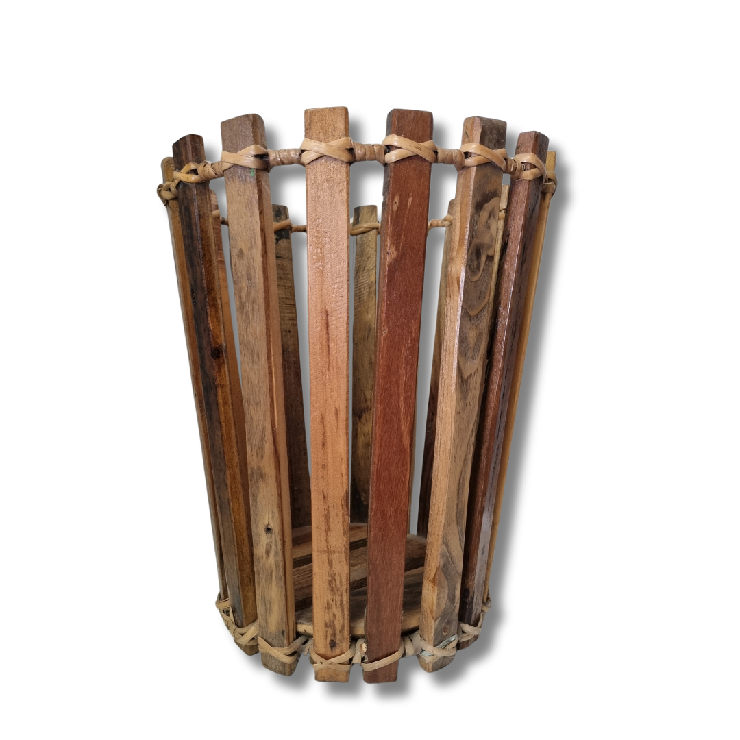 Small 45cm A rustic boat wood basket with varying shades of brown and visible cracks in the wood, indicative of aged maritime material.