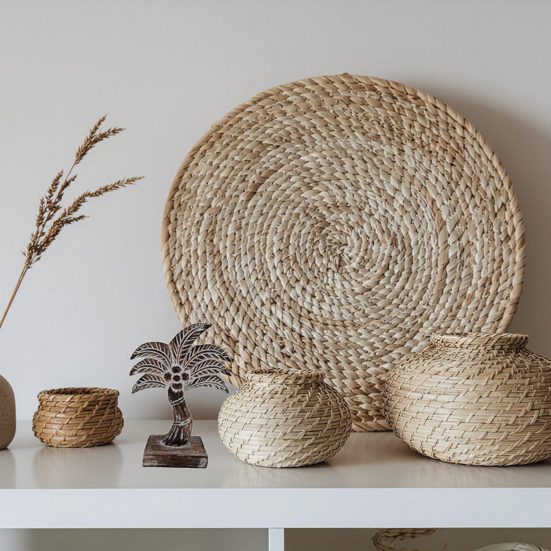 Woven baskets and decorative items on a white surface with a neutral background brown wash wooden coco tree 
