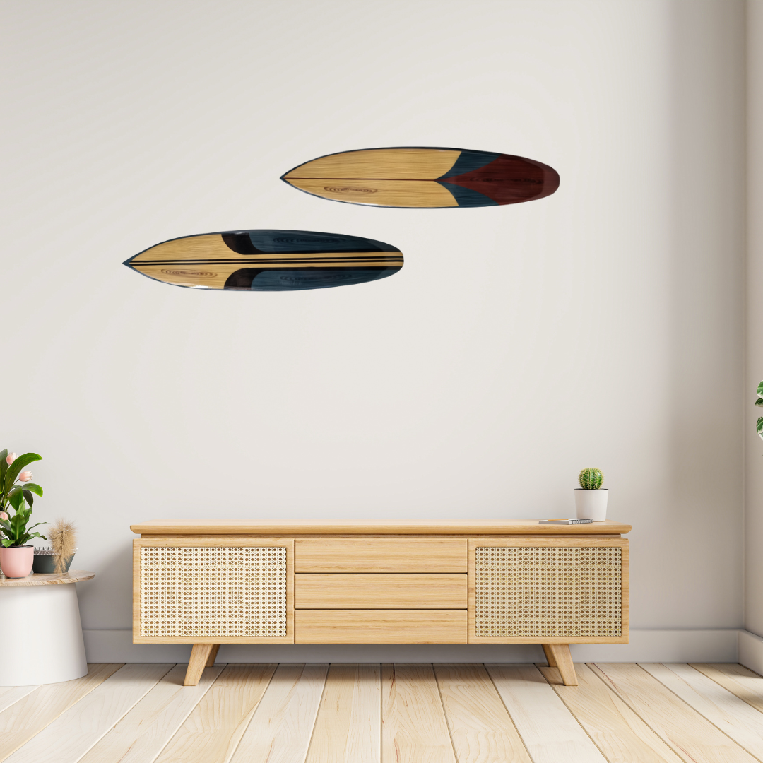 Wooden surfboard wall art above a wooden console table in a room.