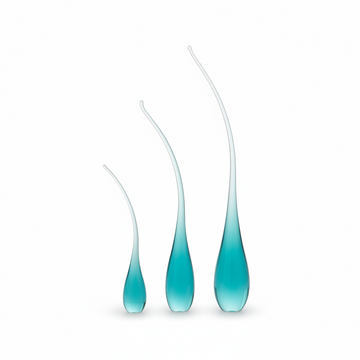 Three glass jewellery holders in small, medium and large sizes on a white background