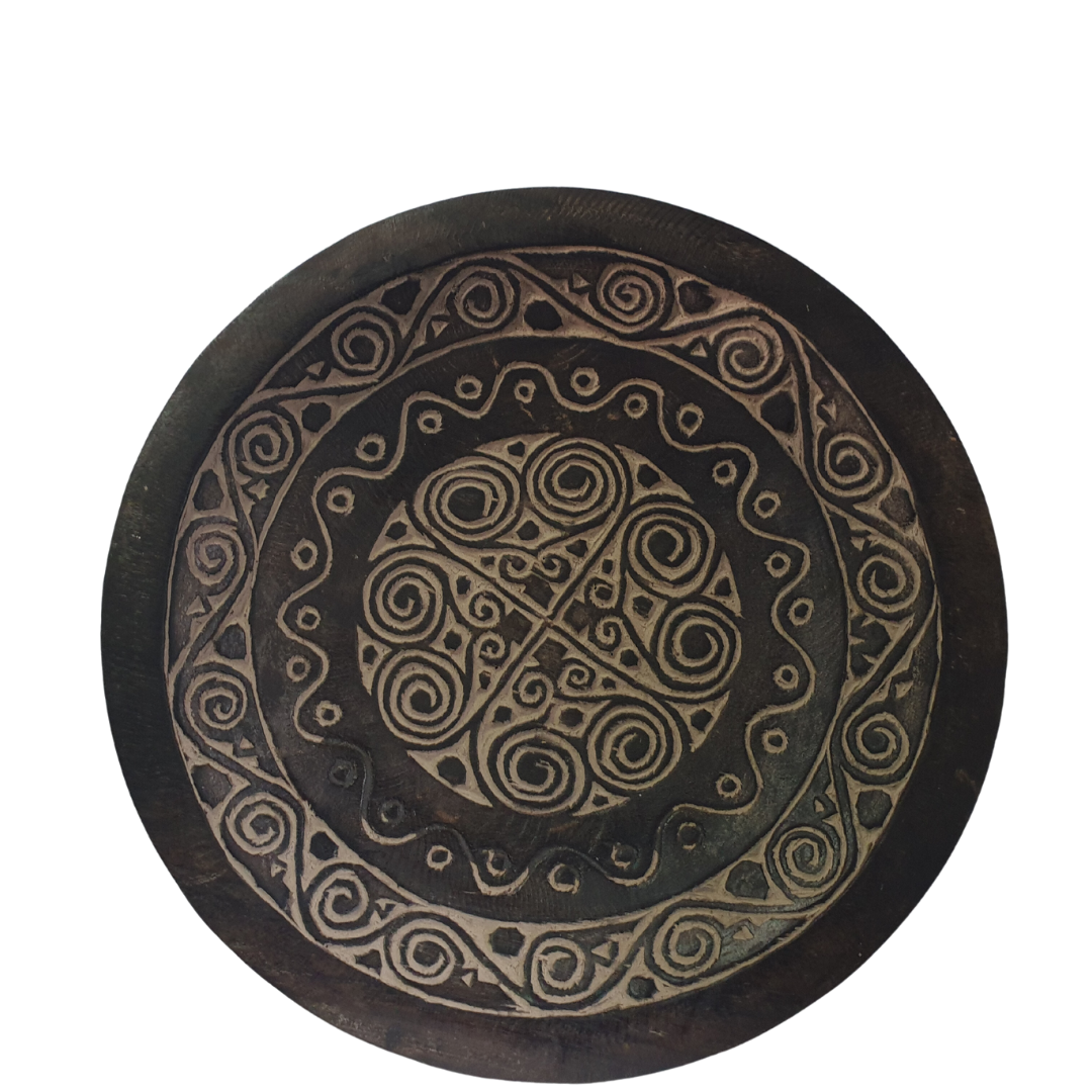 wooden tray on a white back wall 