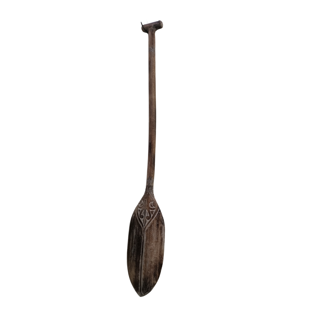this piece has a slight bow in the handle set on a white back wall