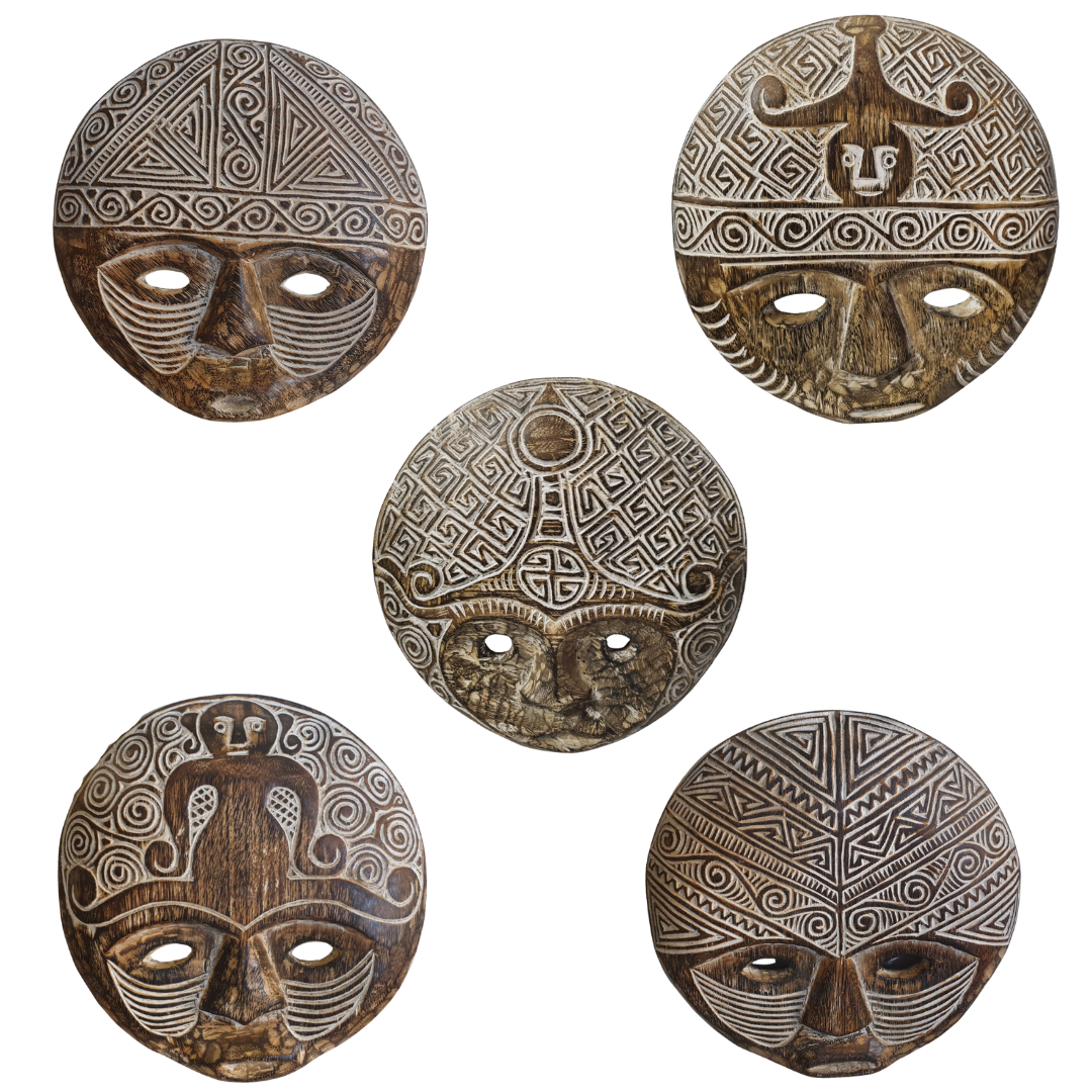Five wooden masks with intricate carvings on a white background