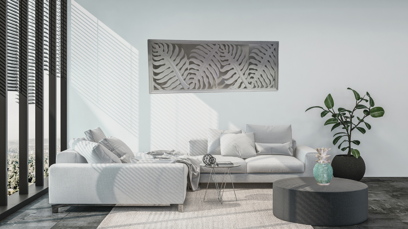 Fern style MDF wall art on the back wall in a modern living room with a sofa, coffee table, and decorative wall art"