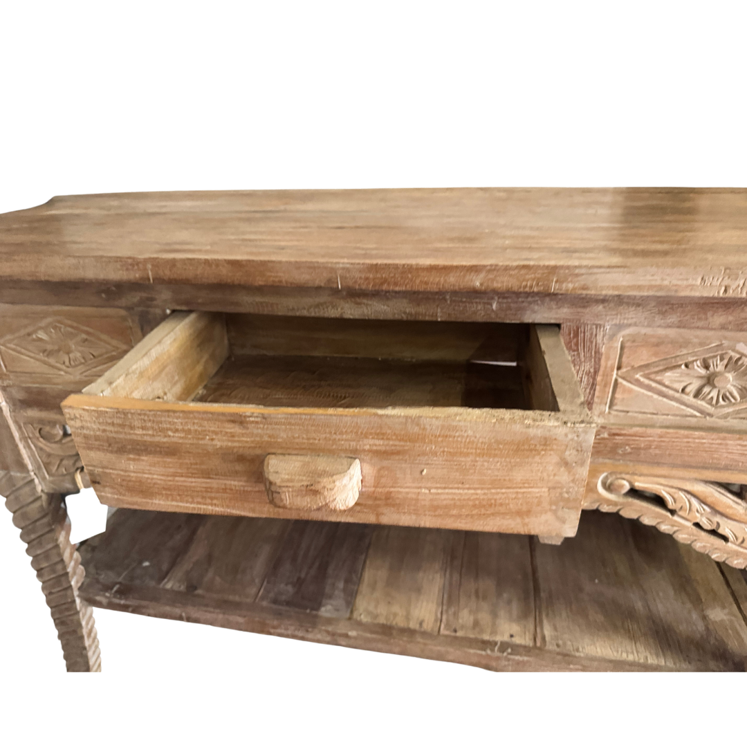 This console table - drawer open showing solid timber construction and Balinese carved drawer front detail
