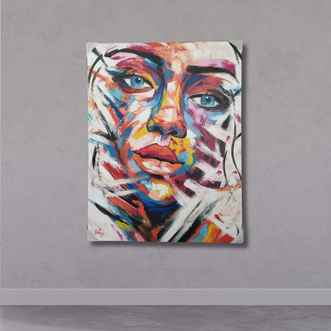 Abstrqact Art picture of a face. on gray wall 
