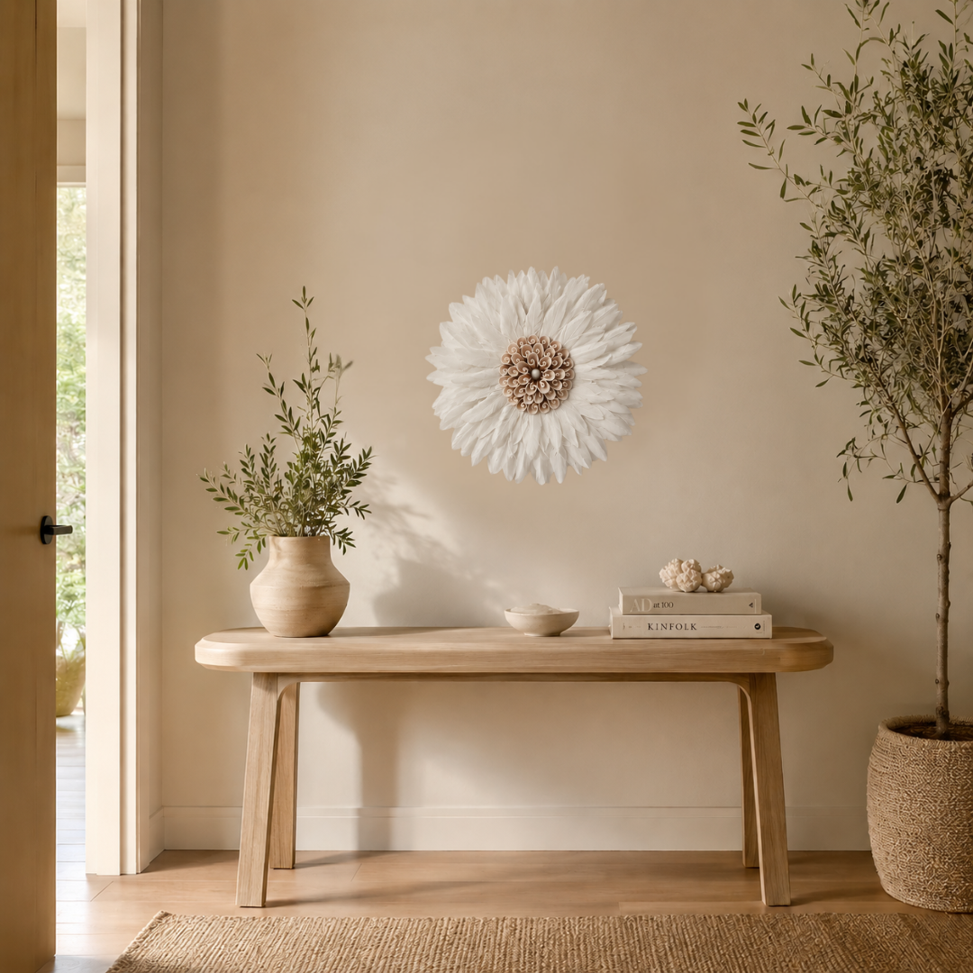 Nest interior design with a wooden bench, decorative items, and plants against a beige wall.