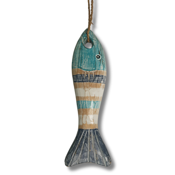 A rustic fish-shaped hanging ornament made from distressed wood, painted with horizontal stripes in teal blue, beige, and off-white, with a dark blue-gray fin and tail. It hangs from a brown string against a plain white background.