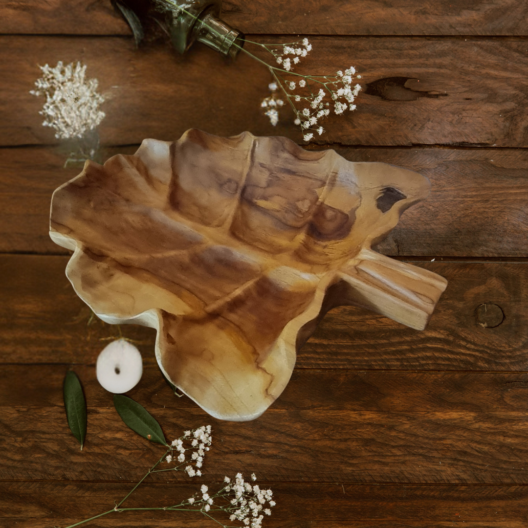 Beautiful wooden leaf tray on wooden Tabel