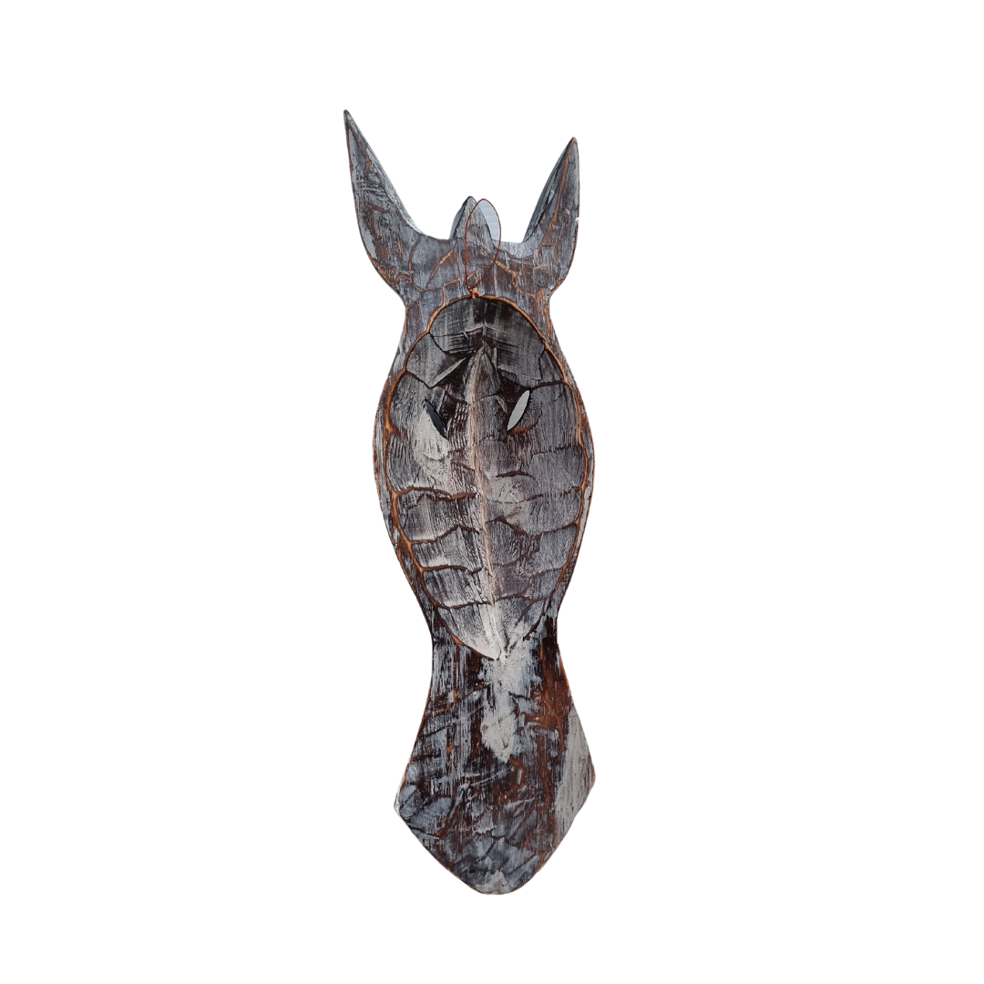 Revise side of a animal style carving 