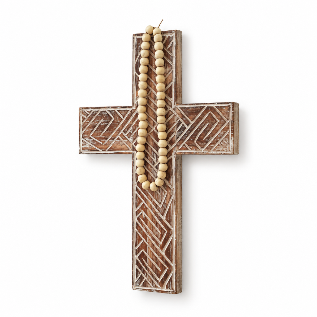 Rustic Boho Wooden Cross viewed at a slight angle, showing its carved detailing, beige beads and timber edge