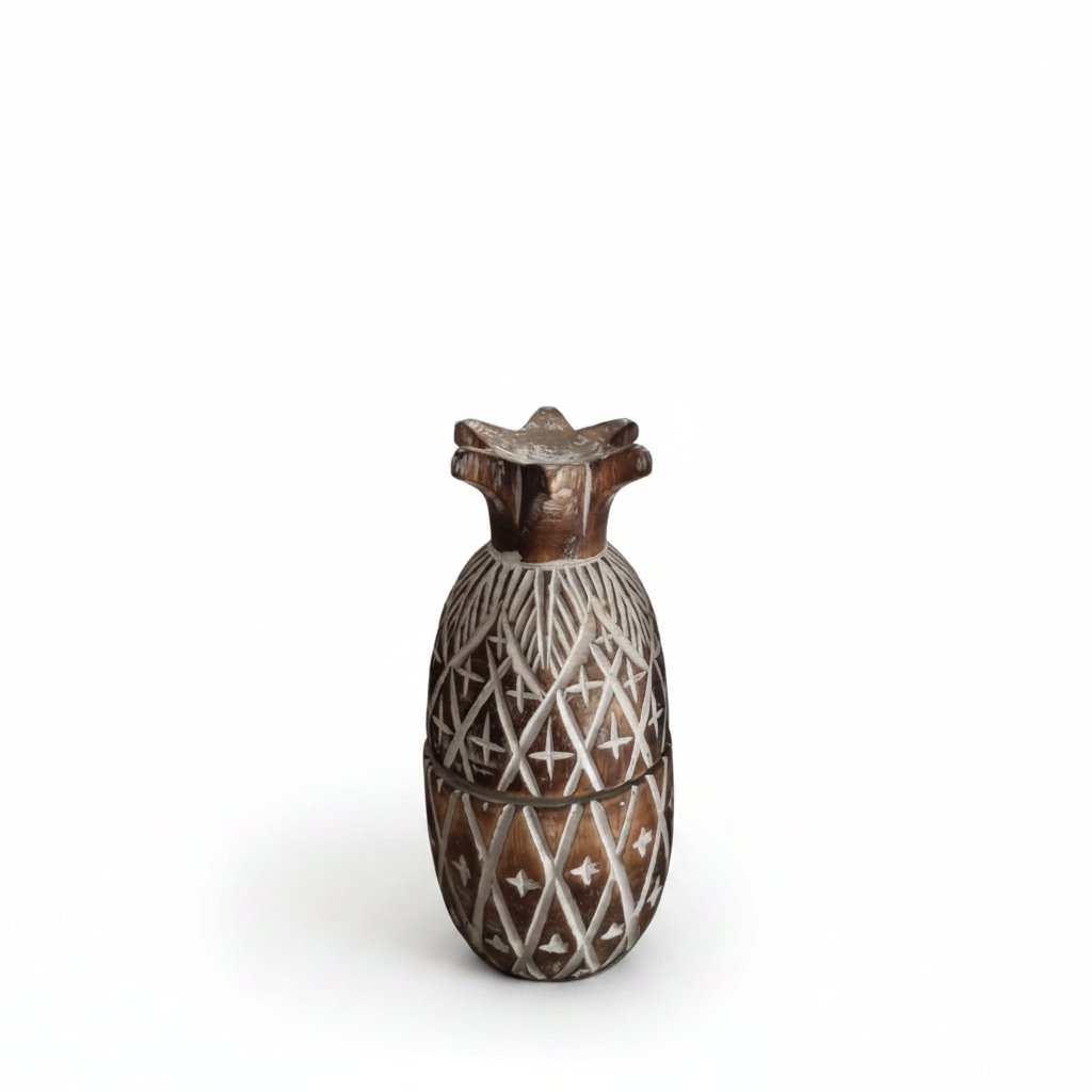 A small carved wooden container shaped like a pineapple, featuring a brown wood body with white painted geometric patterns and a dark brown flared top, set against a plain white background.