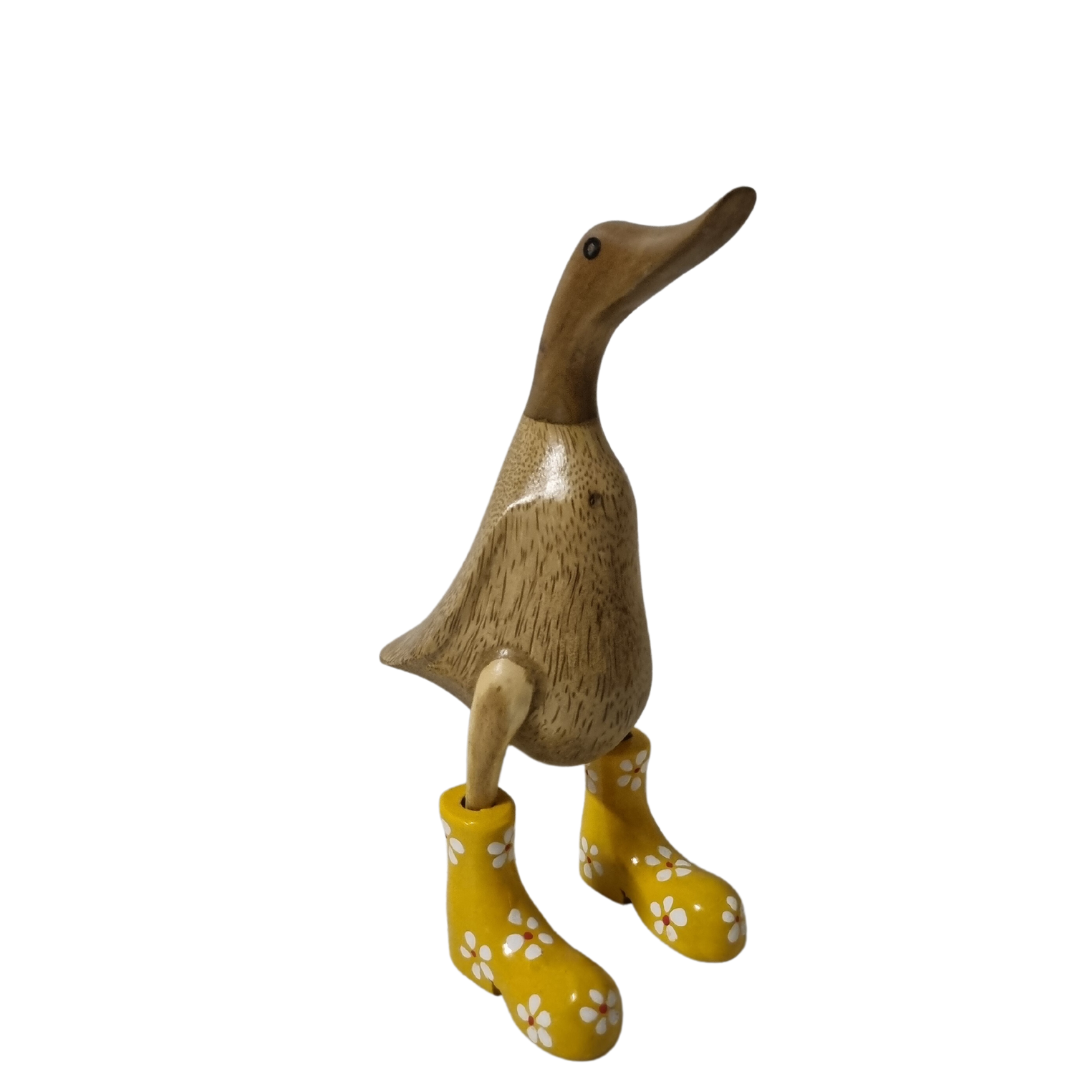 daisy foot ware on a wooden figurine