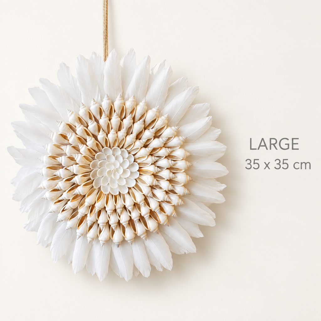 Large 35cm spiral shell wall hanging with three rings of cone shells and white feathers