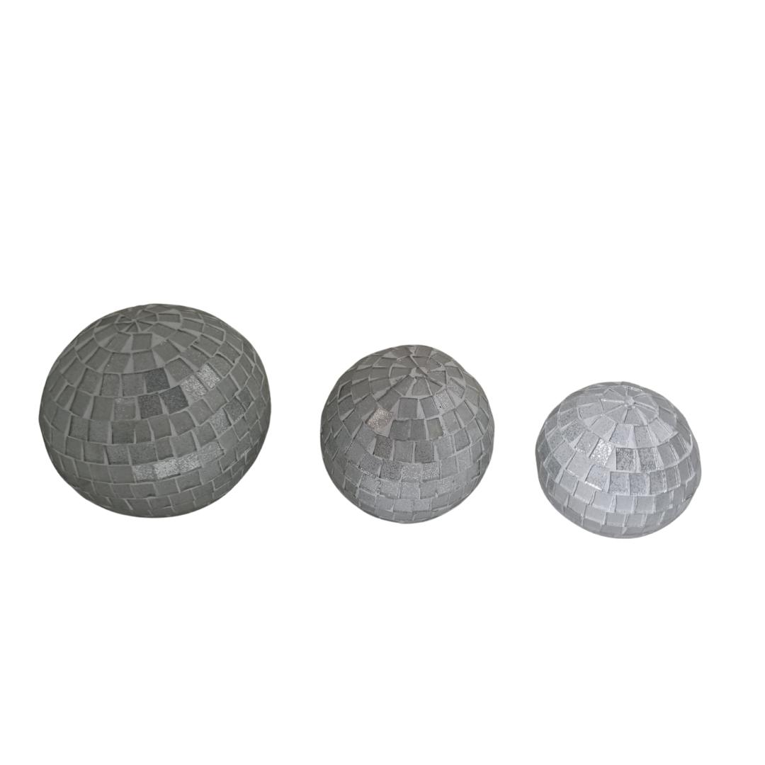 Three white mosaic decorative balls in large, medium and small sizes displayed side by side on a white background
