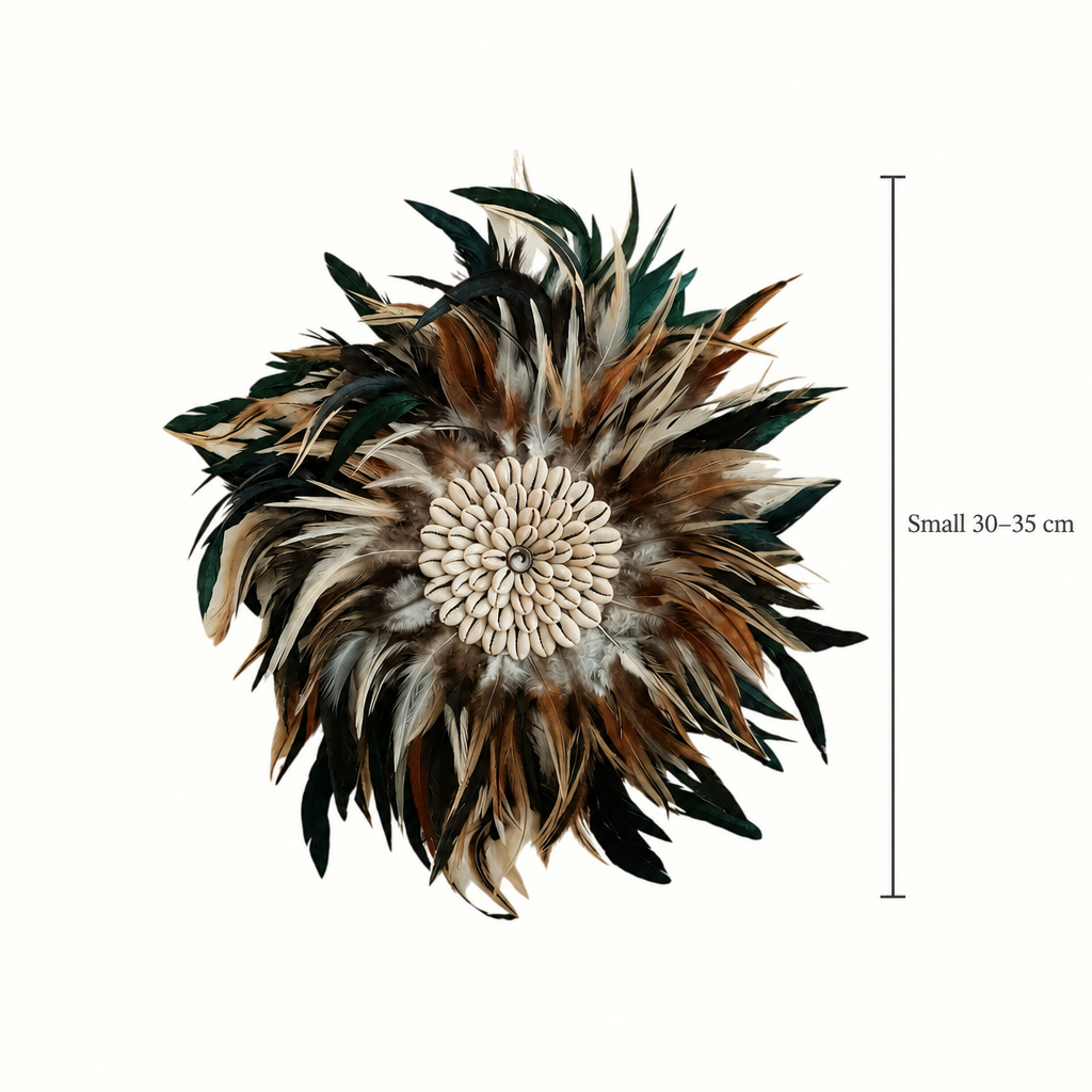 Small dark feather design with cowrie shell centre and 30–35 cm size marker

