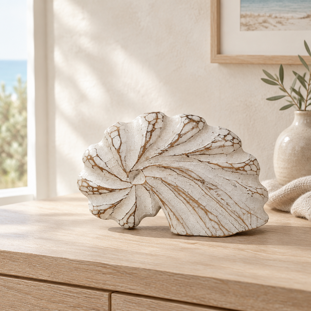 Nautilus shell wooden decor in white wash styled on a pale oak console