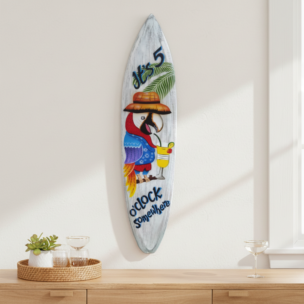 A decorative surfboard-shaped wall hanging with a colorful parrot illustration and the words 'No. 5' and 'O'clock Somewhere' hangs on a light wall above a wooden console table with small decor items.