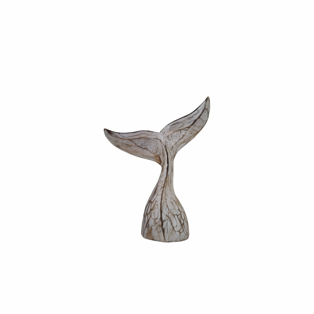 Small whitewashed ornament with curved flukes and dark branching grain against a white background