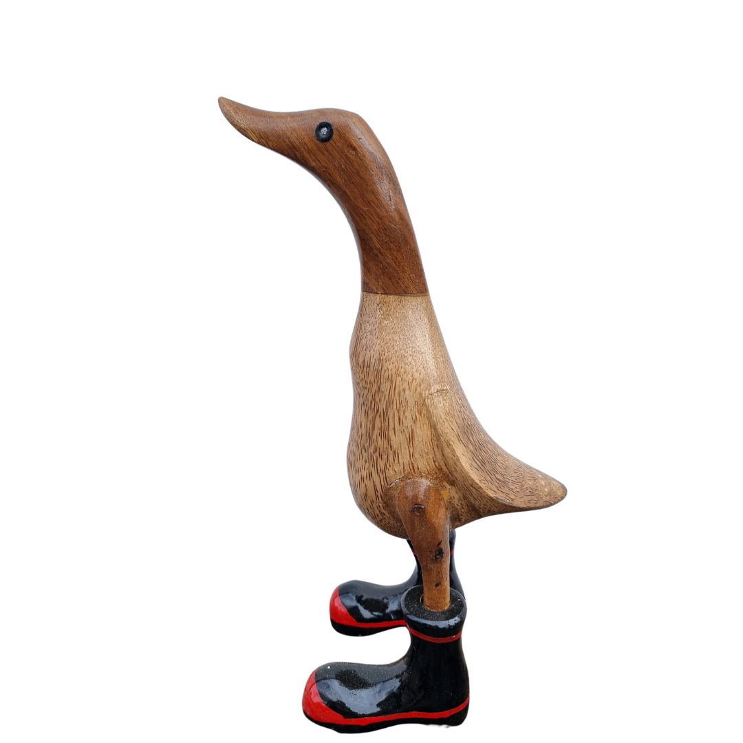 natural style figurine with boack boots on white 