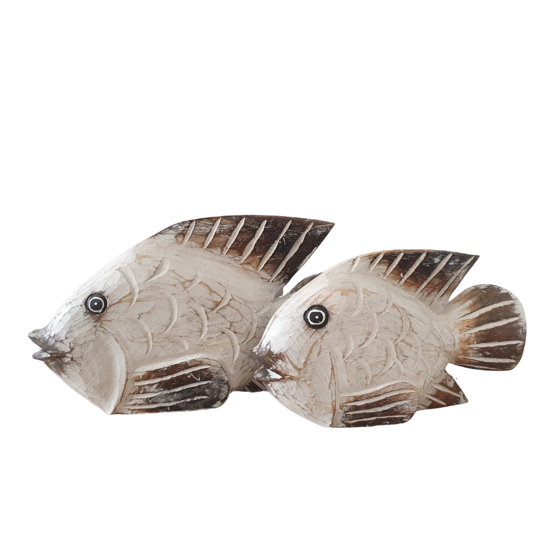 white fish carvings set on a white background 1 x small and 1 x large 