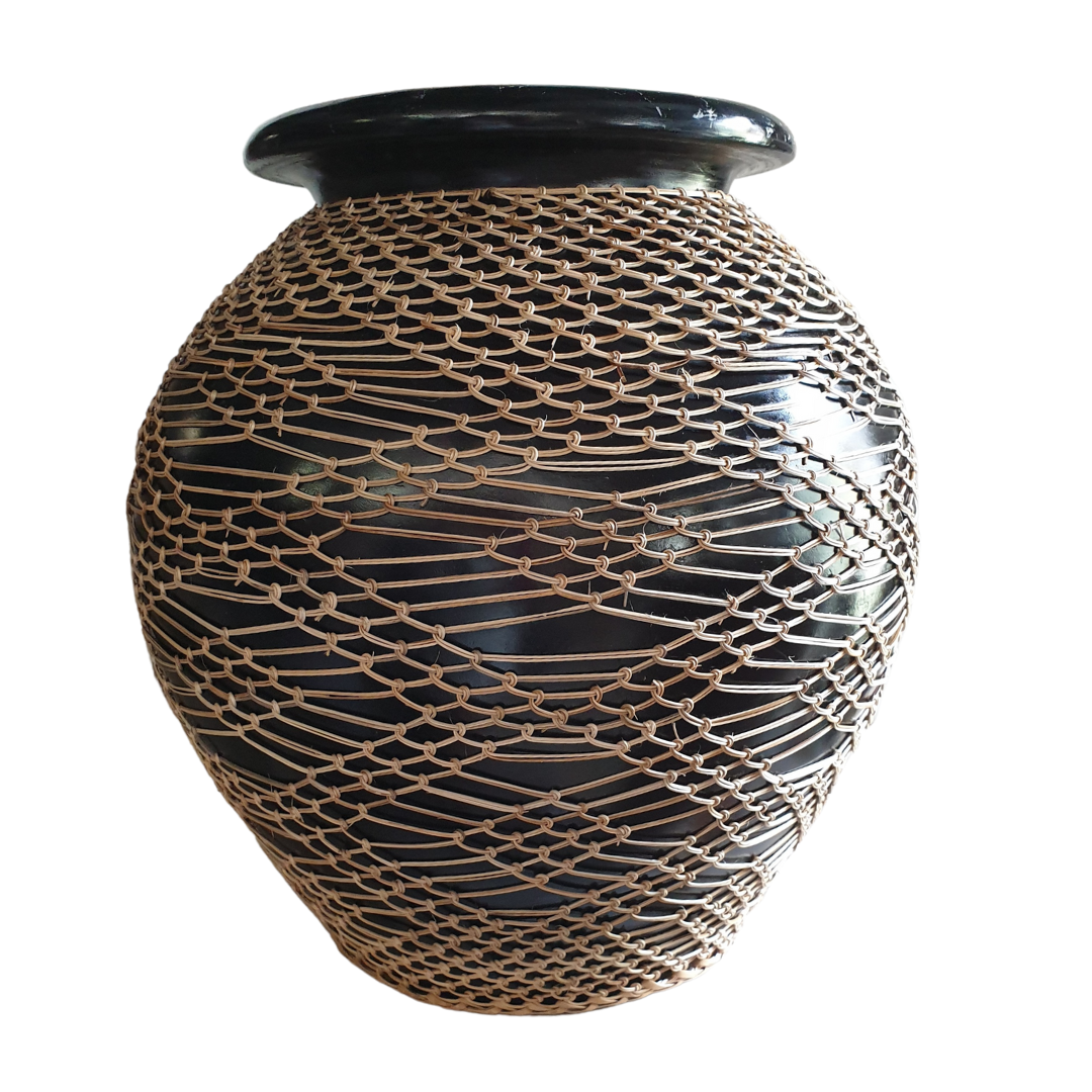 black terracotta vase with knotted rope wrap detail, globe shape with white back ground