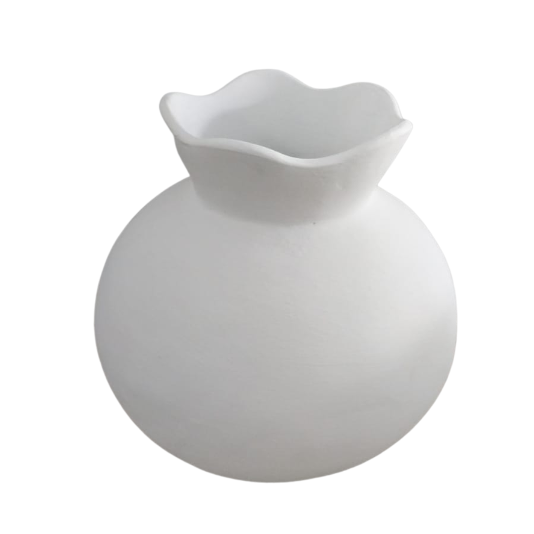 Close-up of a white globe vase with a soft scalloped bevelled rim
