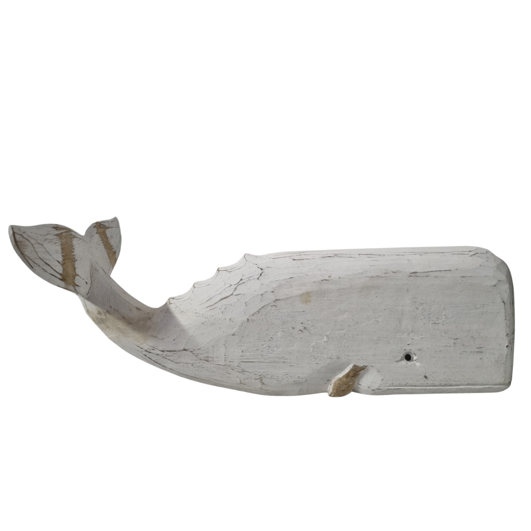 A wooden carved whale decoration in turquoise color with a rustic finish.